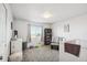 Bedroom with crib, chair, and bookshelf, perfect for a Bedroom at 126 Foxglove Dr, Brighton, CO 80601