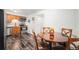 Charming kitchen featuring modern appliances, ample cabinetry, and cozy dining space, perfect for everyday meals at 4509 Everett St, Wheat Ridge, CO 80033