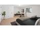 Cozy bedroom with a modern design, neutral colors, and a large window at 2023 Mammoth Ct, Evergreen, CO 80439