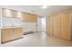 Bonus room with sink and large cabinets for storage or hobbies at 2023 Mammoth Ct, Evergreen, CO 80439