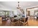 Inviting dining area featuring stylish decor and ample natural light at 2023 Mammoth Ct, Evergreen, CO 80439