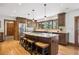 Spacious kitchen with a large center island, stainless steel appliances, and beautiful cabinetry at 2023 Mammoth Ct, Evergreen, CO 80439