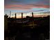 Tranquil outdoor deck at sunset with ambient lighting, perfect for relaxing and enjoying the evening sky at 475 Hampstead Ave, Castle Rock, CO 80104