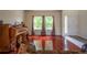 Bright and airy living room with hardwood floors, large windows, and comfortable seating, filled with natural light at 475 Hampstead Ave, Castle Rock, CO 80104