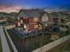 Aerial view features a backyard deck, patio and fenced backyard at 336 Painted Horse Way, Erie, CO 80516