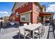 Spacious deck features outdoor dining and seating areas, perfect for entertaining at 336 Painted Horse Way, Erie, CO 80516