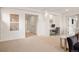 Bright bonus room with a built-in desk area, neutral paint, and modern decor at 336 Painted Horse Way, Erie, CO 80516