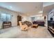 Spacious basement featuring neutral carpet, recessed lighting, and a seating area for entertaining at 17484 E 99Th Ave, Commerce City, CO 80022