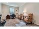 Cozy home office with carpet, a desk, and comfortable seating, perfect for working or reading at 17484 E 99Th Ave, Commerce City, CO 80022