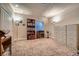 Large storage room with neutral carpet and space for furniture and storage at 17484 E 99Th Ave, Commerce City, CO 80022