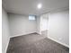 Finished basement featuring neutral carpet and trim, ready for customization at 3061 W 92Nd Ave # 2D, Westminster, CO 80031