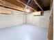 Unfinished basement area showcasing concrete walls and an epoxy-coated floor at 3061 W 92Nd Ave # 2D, Westminster, CO 80031