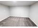 Finished basement showcasing gray carpet, light walls and baseboards at 3061 W 92Nd Ave # 2D, Westminster, CO 80031
