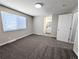 Spacious bedroom features neutral walls, plush carpet, and an ensuite bathroom at 3061 W 92Nd Ave # 2D, Westminster, CO 80031