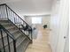 Modern living room with a staircase and open layout at 3061 W 92Nd Ave # 2D, Westminster, CO 80031