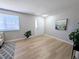 Light and airy living room featuring wood-look floors and a welcoming atmosphere at 3061 W 92Nd Ave # 2D, Westminster, CO 80031