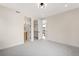 Spacious bedroom with access to a bathroom and walk-in closet at 1601 S Columbine St, Denver, CO 80210