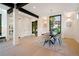 Contemporary dining room offers open entry and view of the landscaped property at 1601 S Columbine St, Denver, CO 80210