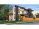 Modern home featuring clean lines, large windows, and a fenced yard, showcasing contemporary design at 1601 S Columbine St, Denver, CO 80210