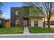 Modern two-story home with a dark brick accent, manicured lawn, and a inviting front entrance at 1601 S Columbine St, Denver, CO 80210