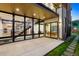 Exterior view of the home features a patio and views to the interior living spaces at 1601 S Columbine St, Denver, CO 80210