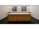Stylish kitchen island features a white countertop and dark wood cabinets at 1601 S Columbine St, Denver, CO 80210
