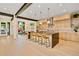Spacious kitchen with a large center island, modern lighting, and an open layout at 1601 S Columbine St, Denver, CO 80210