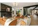 Bright, modern living room featuring fireplace, and adjacent staircase at 1601 S Columbine St, Denver, CO 80210