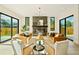 Beautiful living room featuring a modern fireplace, contemporary furniture, and lots of natural light at 1601 S Columbine St, Denver, CO 80210