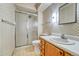 Bathroom with shower/tub and updated vanity at 6940 E Girard Ave # 203, Denver, CO 80224