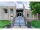 Clubhouse entrance with steps and landscaping at 6940 E Girard Ave # 203, Denver, CO 80224