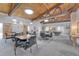 Common area with tables and chairs for residents at 6940 E Girard Ave # 203, Denver, CO 80224