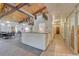 Common area with kitchenette and hallway at 6940 E Girard Ave # 203, Denver, CO 80224