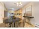Charming dining area with a round table and stylish decor at 6940 E Girard Ave # 203, Denver, CO 80224