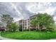 Building exterior showcasing landscaping and architecture at 6940 E Girard Ave # 203, Denver, CO 80224