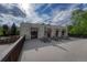 Shared patio area with picnic tables and building access at 6940 E Girard Ave # 203, Denver, CO 80224