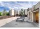 Community patio with tables and chairs, ideal for outdoor gatherings at 6940 E Girard Ave # 203, Denver, CO 80224