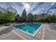 Outdoor swimming pool with surrounding patio at 6940 E Girard Ave # 203, Denver, CO 80224
