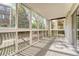 Bright sunroom with windows offering scenic views at 6940 E Girard Ave # 203, Denver, CO 80224