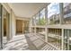 Sunroom with ample natural light and access to the outdoors at 6940 E Girard Ave # 203, Denver, CO 80224