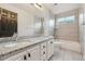 Modern bathroom with granite countertops and a bathtub at 15008 Clayton St, Thornton, CO 80602