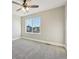 Well-lit bedroom featuring a ceiling fan and neutral decor at 15008 Clayton St, Thornton, CO 80602