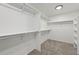 Spacious walk-in closet with ample shelving and hanging space at 15008 Clayton St, Thornton, CO 80602