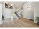 Bright living room featuring hardwood floors and high ceilings at 15008 Clayton St, Thornton, CO 80602