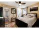 Cozy bedroom with hardwood floors and decorative accents at 2610 S Vine St, Denver, CO 80210