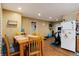 Dining area adjacent to kitchen and home gym at 2610 S Vine St, Denver, CO 80210