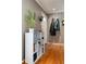 Bright entryway with built-in shelving and hardwood floors at 2610 S Vine St, Denver, CO 80210