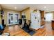 Bright kitchen features ample cabinetry and access to backyard at 2610 S Vine St, Denver, CO 80210