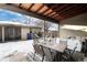 Covered patio with seating area, perfect for outdoor entertaining at 2610 S Vine St, Denver, CO 80210