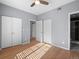 Bright bedroom with hardwood floors, closet, and ensuite bathroom at 5335 Pecos Way # 4, Denver, CO 80221